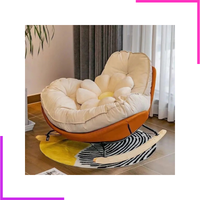 Fauteuil à bascule (rocking chair) ergonomique pour l'allaitement et la détente.