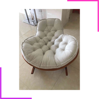 Fauteuil à bascule (rocking chair) ergonomique pour l'allaitement et la détente.