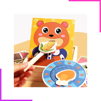 Jeu d'imitation en bois et diverses pièces d'aliments colorées.